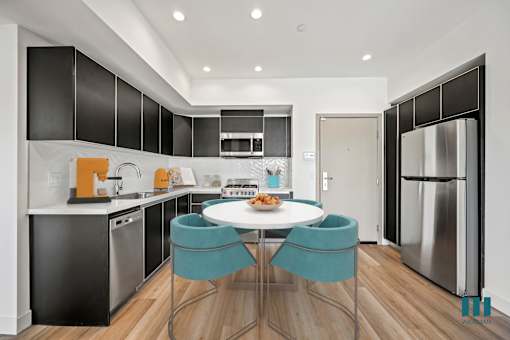 Kitchen with Stainless-Steel Appliances and Ample Cabinet Storage - Madison Floor Plan