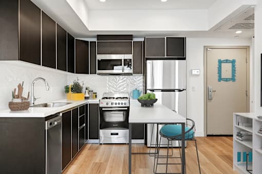 Open-Concept Kitchen with Stainless-Steel Appliances -Overland Floor Plan