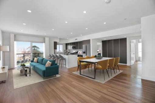 Open-Concept Kitchen, Dining, and Living Room Space with Patio