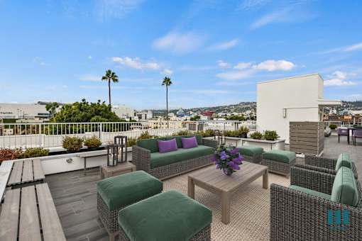 Rooftop Terrace with Entertainment and Seating Area