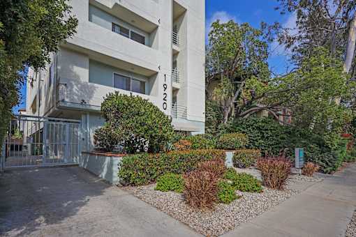 Sidewalk View of Overland Century by Wiseman