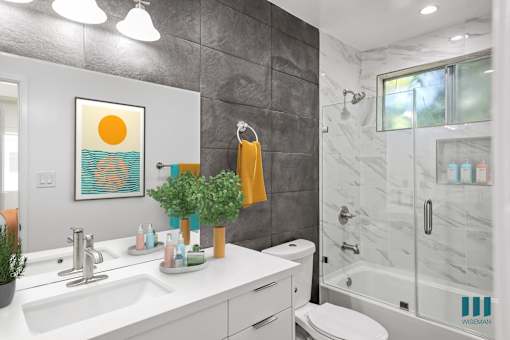 Bathroom with Shower Bath with Glass Door, and Vanity Cabinet Storage