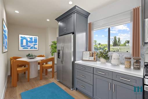 Kitchen with Stainless-Steel Appliances and Dining Area