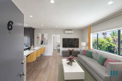 Front Entrance with Open-Concept Kitchen, Dining, and Living Room