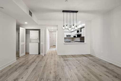 Open-Concept Kitchen and Dining Space and In-Suite Washer & Dryer