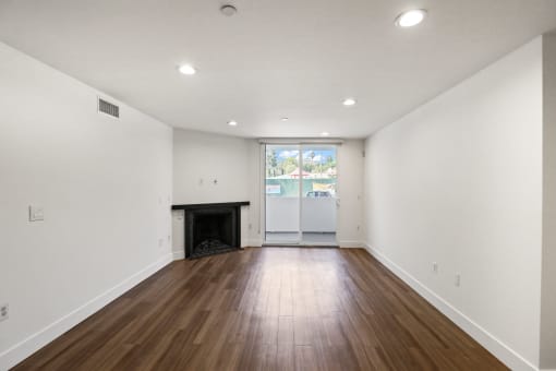Living Room with Electric Fireplace, Recessed Lighting, Vinyl Flooring, and Patio