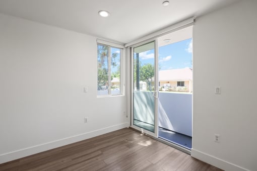 Bedroom with Windows and Patio