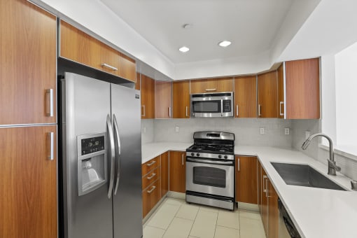 Kitchen with Energy-Efficient Refrigerator, Stove, Microwave Oven, and Dishwasher
