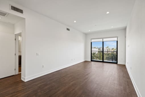 Large-Size Bedroom with Recessed Lighting, Vinyl Flooring, and Balcony Access