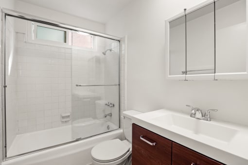 Bathroom with a Bathtub and Glass Doors
