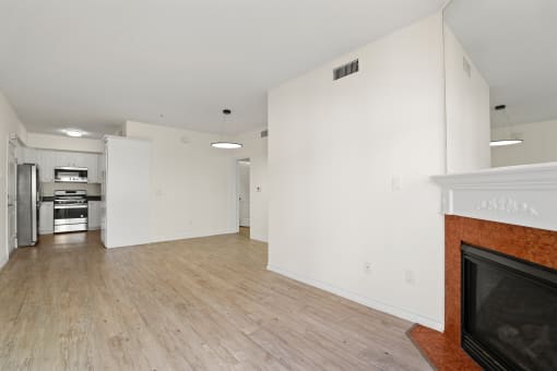 Open-Concept Dining and Living Room with Electric Fireplace