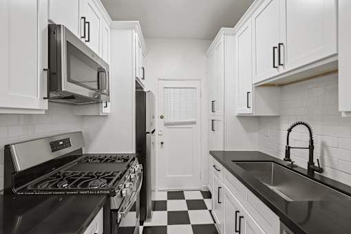 Kitchen with Energy-Efficient Appliances and Ample Cabinet Space