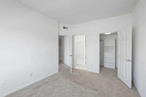 Bedroom with Bathroom and Walk-In Closet with Built-In Organizers