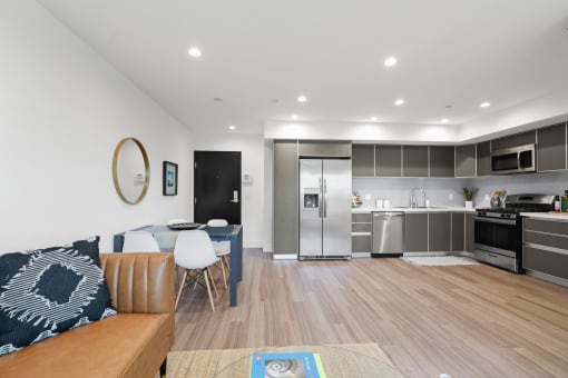 Open-Concept Kitchen, Dining, and Living Room Spaces