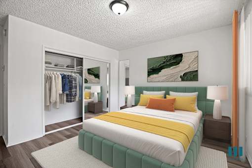 A bedroom with a bed, nightstand, and a painting on the wall.