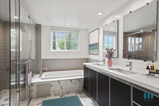 Bathroom with Bathtub, Walk-In Shower, and Double-Sink Vanity with Cabinet Storage