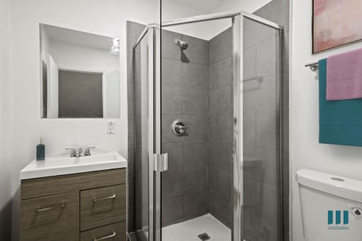 Bathroom with Stand-Up Shower and Vanity Cabinet Storage