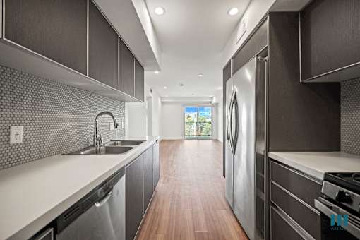Kitchen with Energy-Efficient Appliances and Ample Cabinet Storage