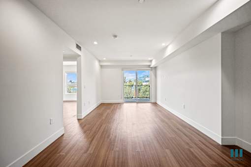 Open-Concept Dining and Living Room Space with Patio