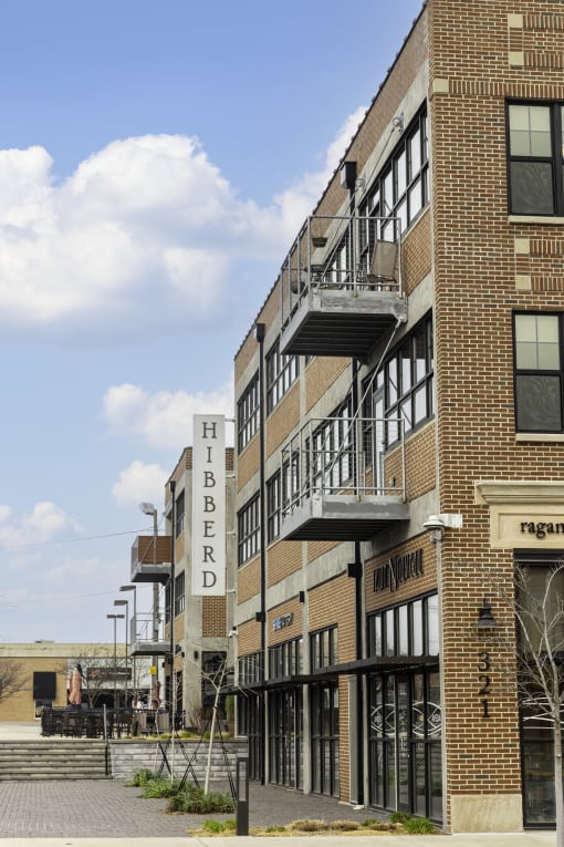 a brick building with a sign on the side of it