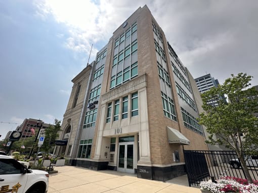 a building with a clock on the side of it