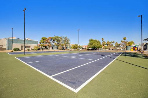 Exterior Tennis Court at Woodcreek Apartments in Las Vegas NV