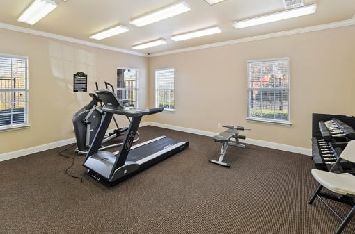 Fitness center at Cypress View Villas Apartments in Weatherford, TX