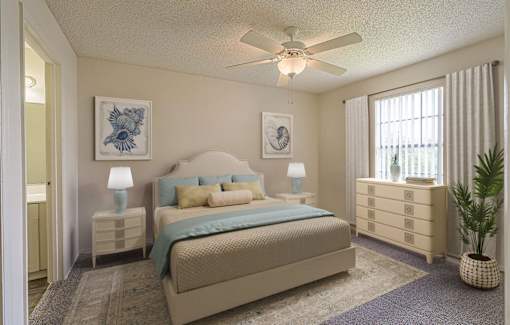A bedroom with a bed, nightstands, and a plant.