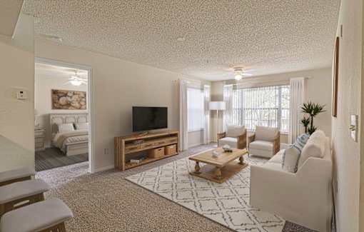 A living room with a television, couch, and rug.