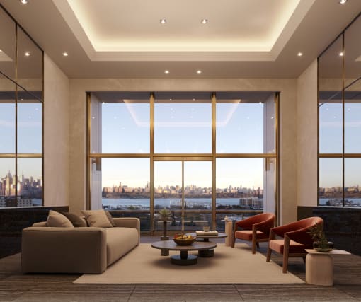 a living room with a view of the nyc skyline