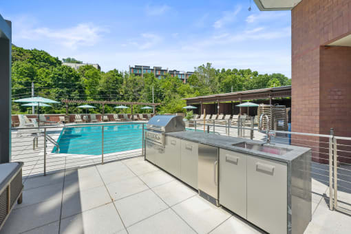 the swimming pool at the theorem apartments in lodges at Riello Apartments Owner LLC, Edgewater, NJ, 07020