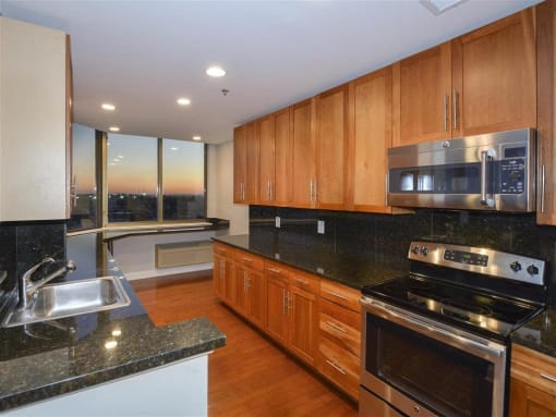 Fully Furnished Kitchen With Stainless Steel Appliances at Riello Apartments Owner LLC, Edgewater, NJ
