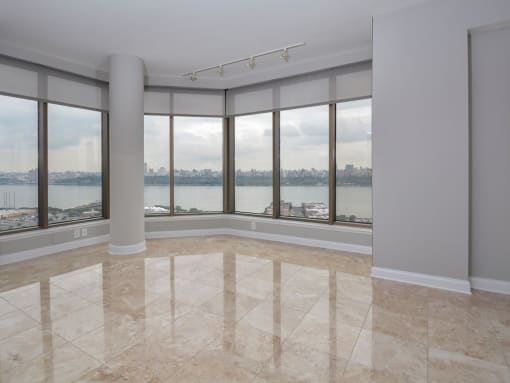Living Room With Expansive Window at Riello Apartments Owner LLC, Edgewater, NJ