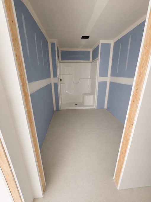 A room with blue walls and white trim.
