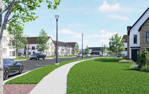 A street view of a residential area with houses and parked cars at The Daniels at Northern Gateway Apartments, Saukville 53080