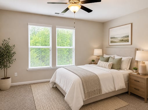 A bedroom with bed and painting with double window natural lighting