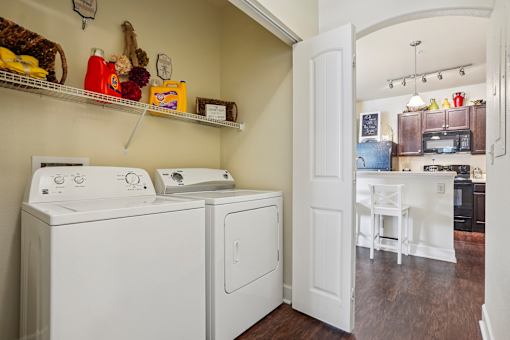 A laundry room with a washer and dryer.