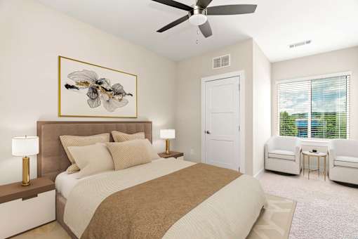 A bedroom with a bed, two lamps, a painting, a chair, and a ceiling fan.