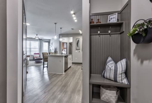 view from the living room into the kitchen and dining room of a model home