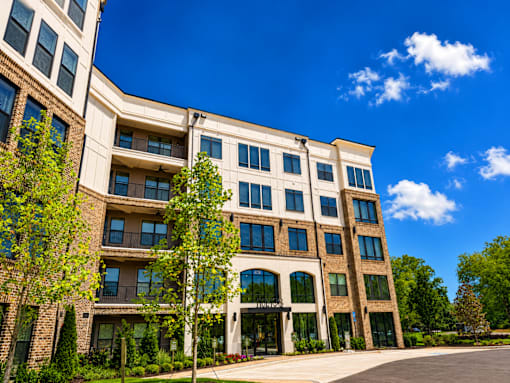 A large building with a lot of windows and balconies.