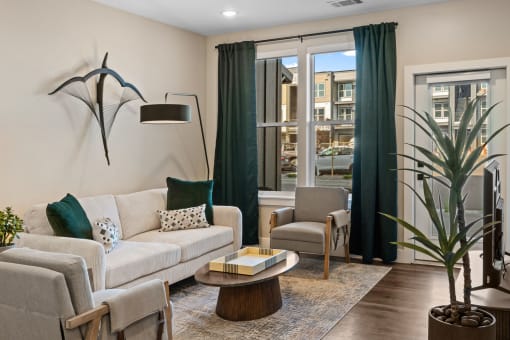 a living room with a couch and a table