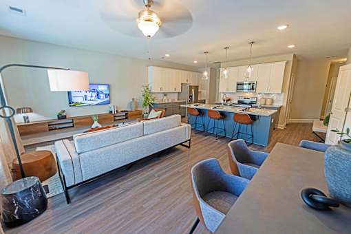 an open floor plan with a kitchen and living room