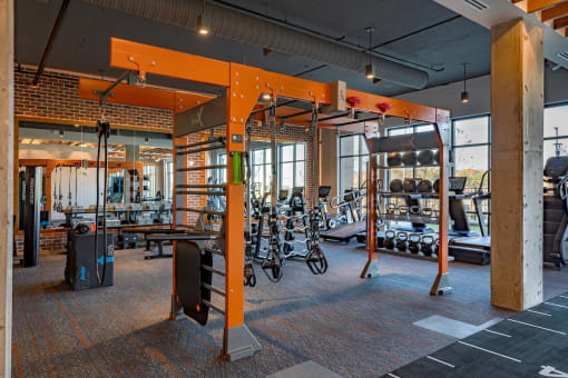 a gym with weights machines and other exercise equipment