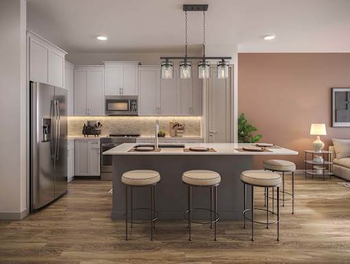 A modern kitchen with a refrigerator, stove, and bar stools.