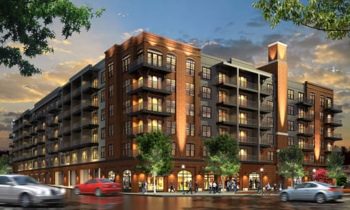 a rendering of a large apartment building on a city street