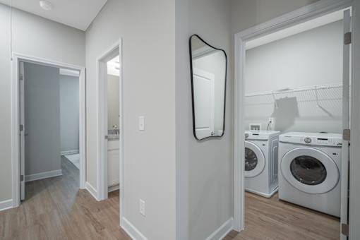 A laundry room with a washer and dryer.