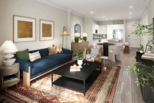 A living room with a blue couch and a coffee table.