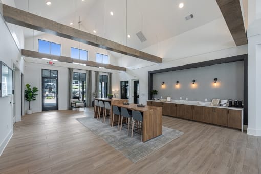 a large kitchen and dining room with a large table and chairs