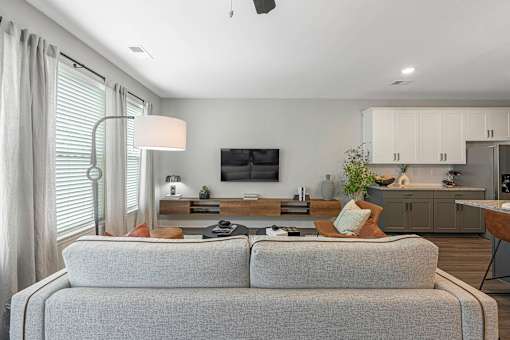 a living room with a couch and a table