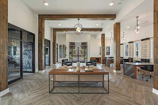 a large room with a table and chairs in it